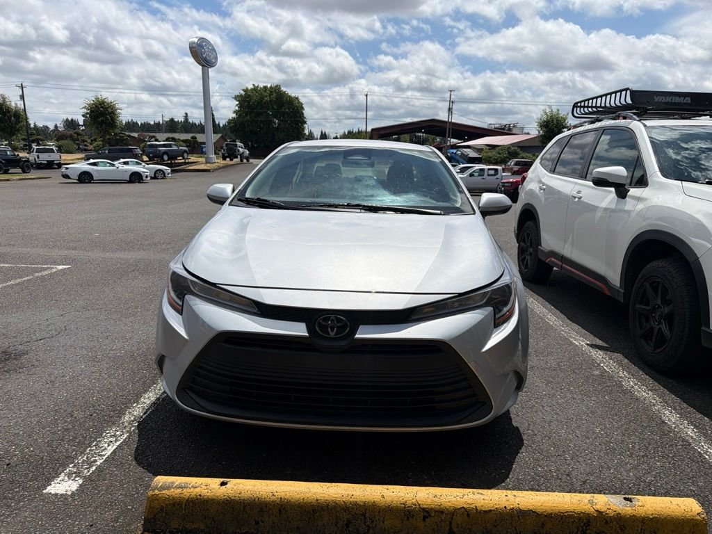 Used 2024 Classic Silver Metallic Toyota LE image 1