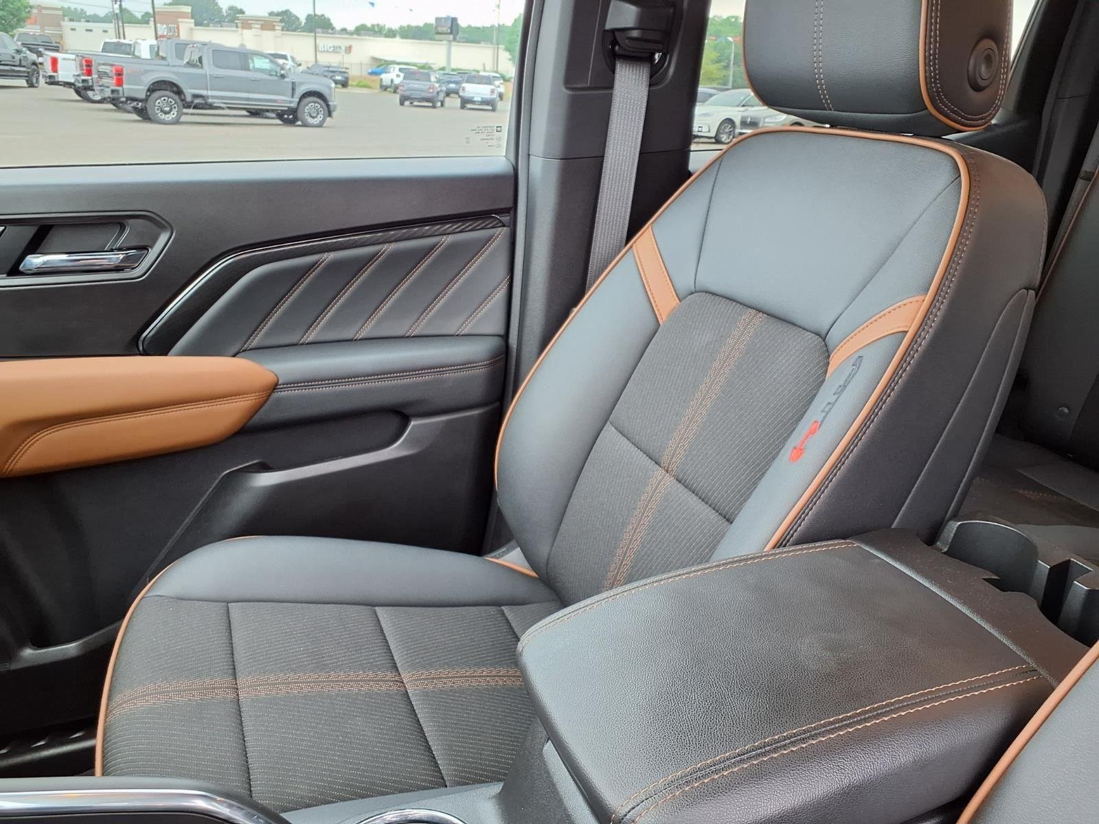 Used 2025 Volcanic Red Tintcoat GMC 4WD AT4 image 21
