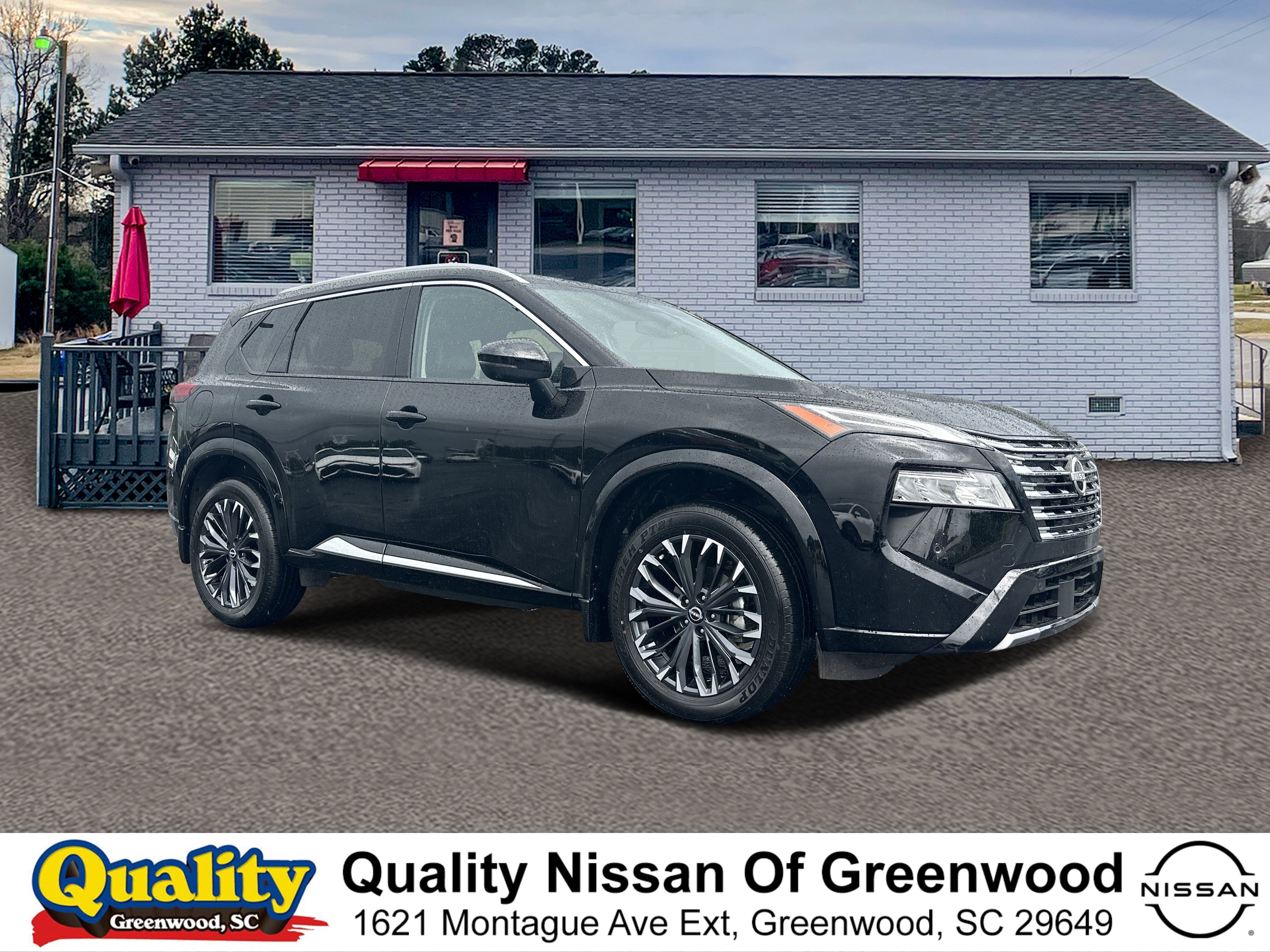 Used 2024 Super Black Nissan Platinum image 1