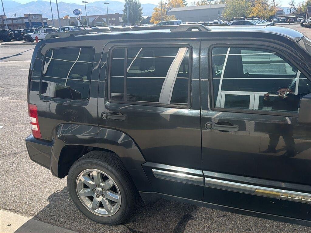 Used 2012 Brilliant Black Crystal Pearl Jeep Sport Latitude image 14