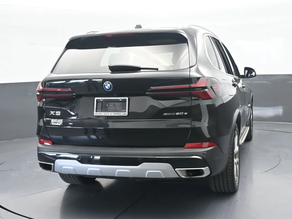 Used 2025 Black Sapphire Metallic BMW xDrive50e image 5