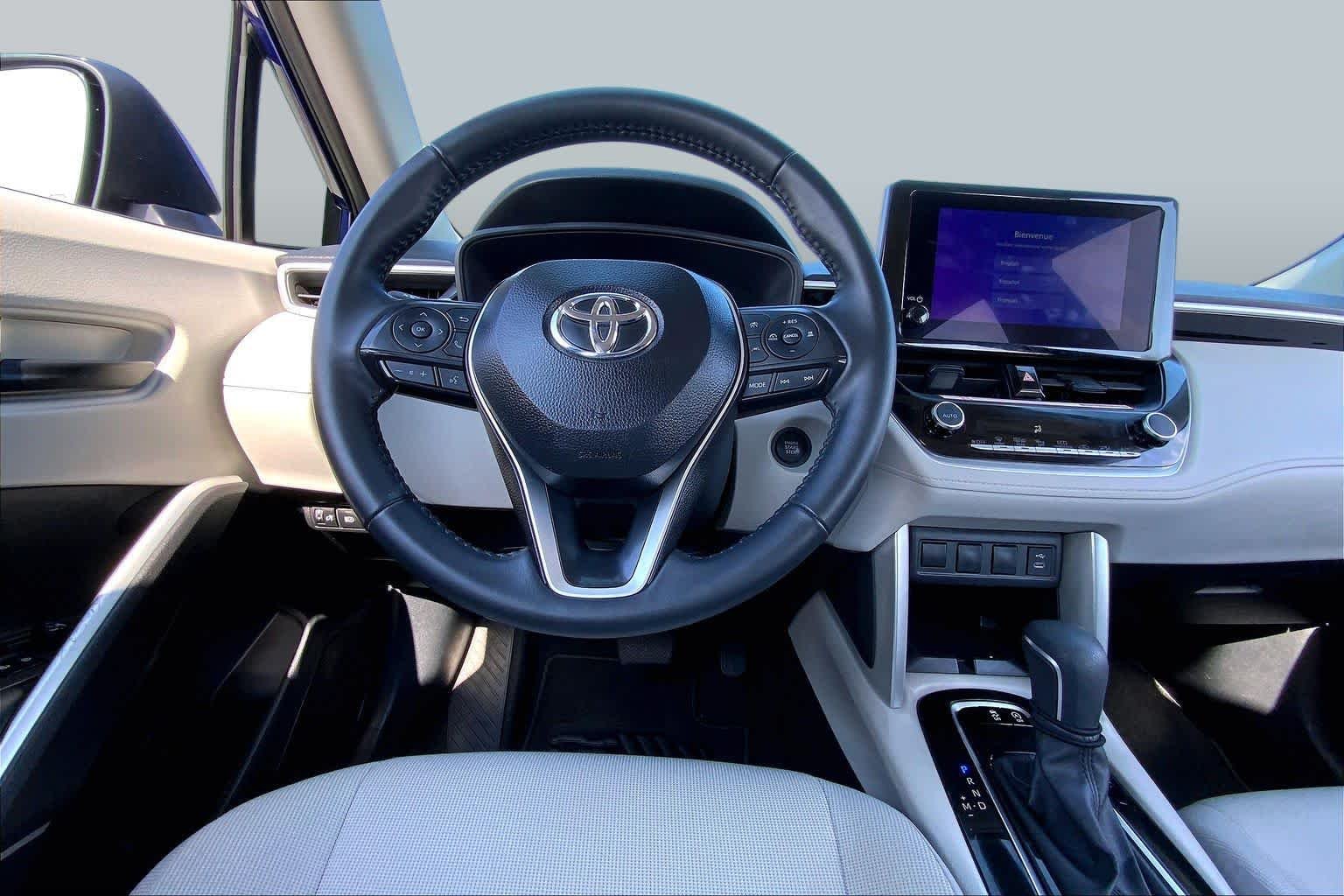 Certified Used 2025 Blue Crush Metallic Toyota LE image 6