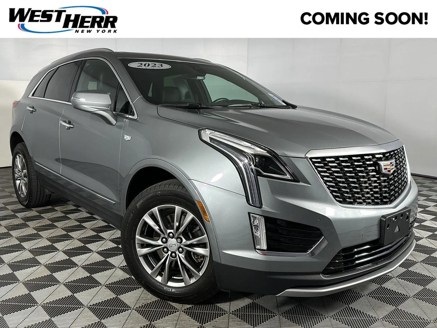 Used 2023 Argent Silver Metallic Cadillac AWD Premium Luxury image 1