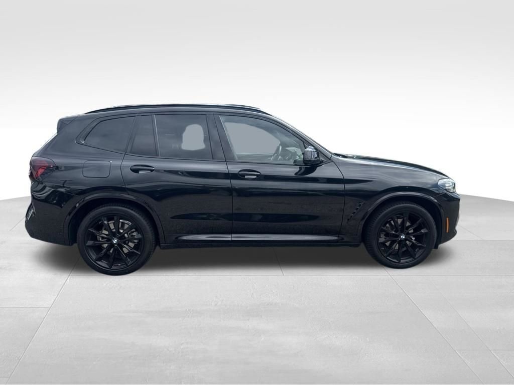 Used 2024 Black BMW sDrive30i image 2