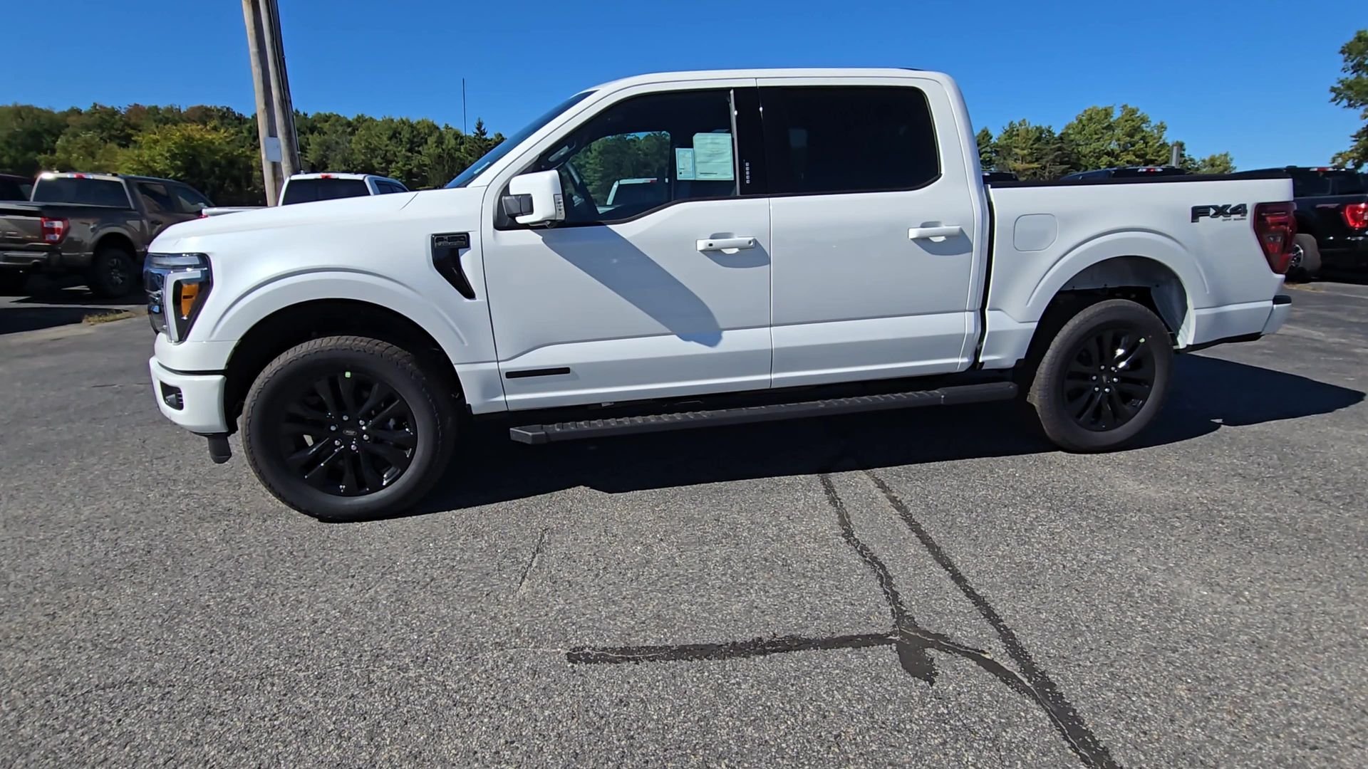 New 2026 Star White Metallic Tri-Coat Ford Lariat® image 16