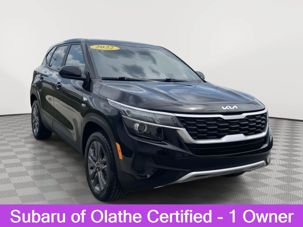 Used 2022 Cherry Black Kia LX image 1