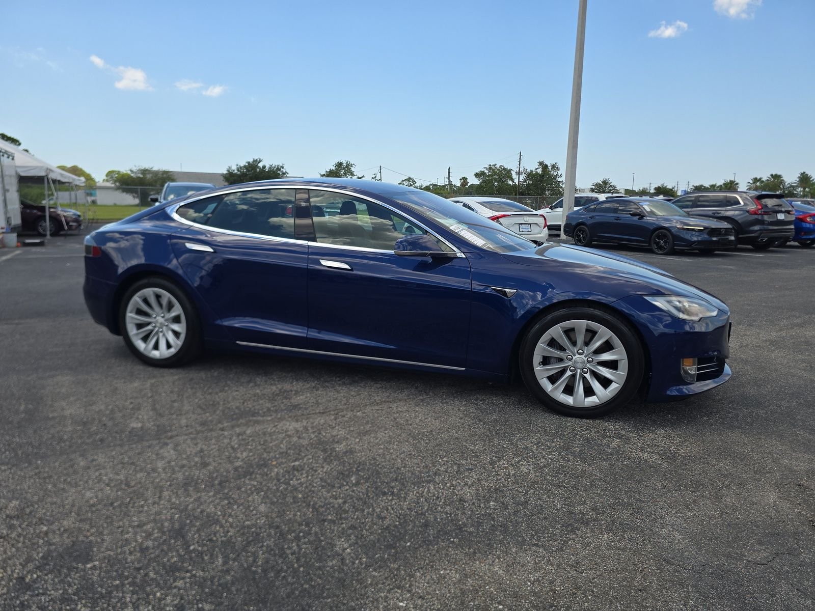 Used 2016 Tesla Model S 60D with VIN 5YJSA1E28GF173251 for sale in Port Richey, FL
