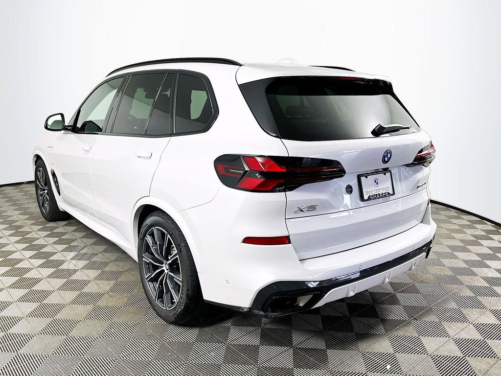Used 2026 White Metallic BMW xDrive50e image 7