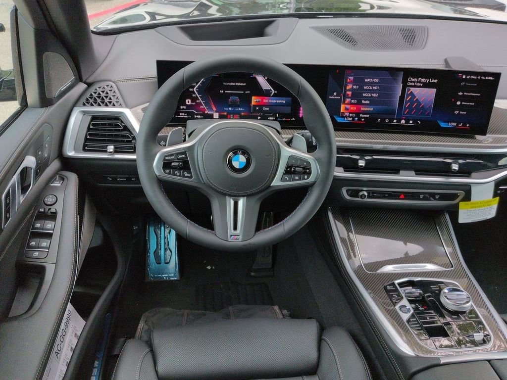 New 2026 Black Sapphire Metallic BMW M60i image 16