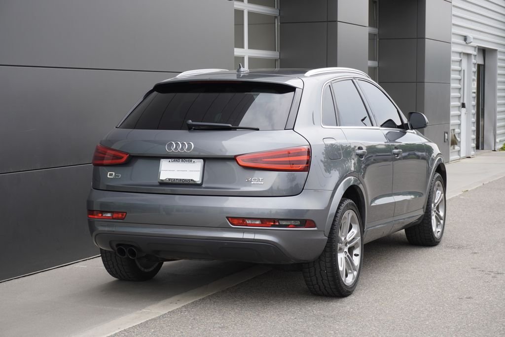 Used 2015 Audi Q3 Premium Plus with VIN WA1EFCFS1FR001915 for sale in Broomfield, CO