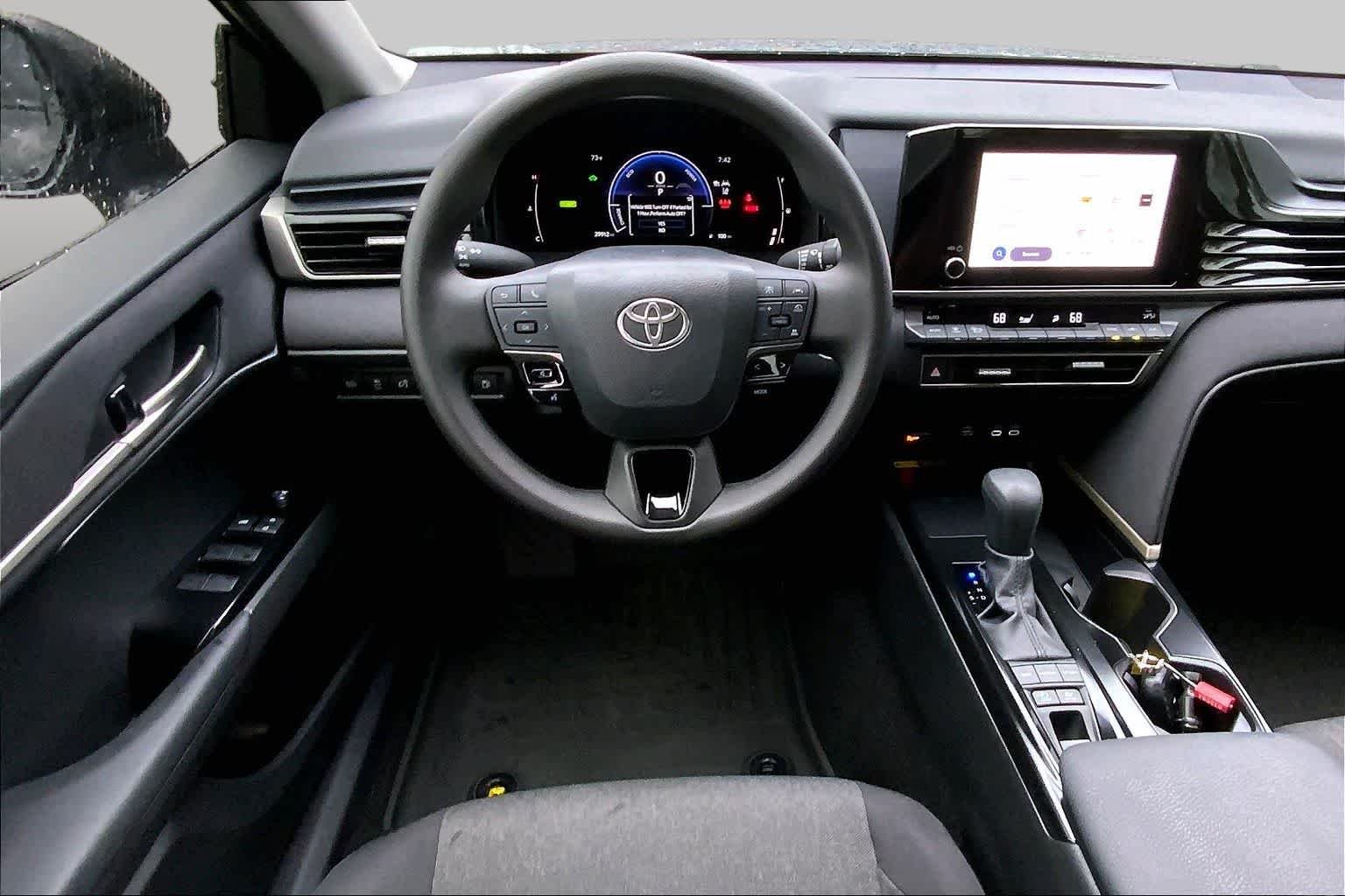 Used 2025 Midnight Black Metallic Toyota LE image 6