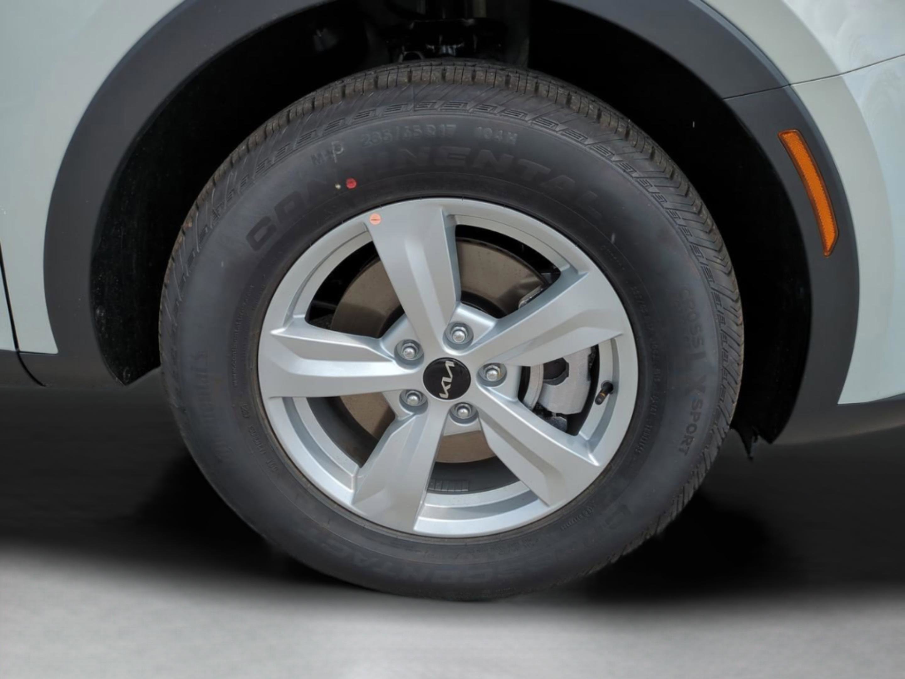 New 2026 Ivory Silver Kia LX image 13