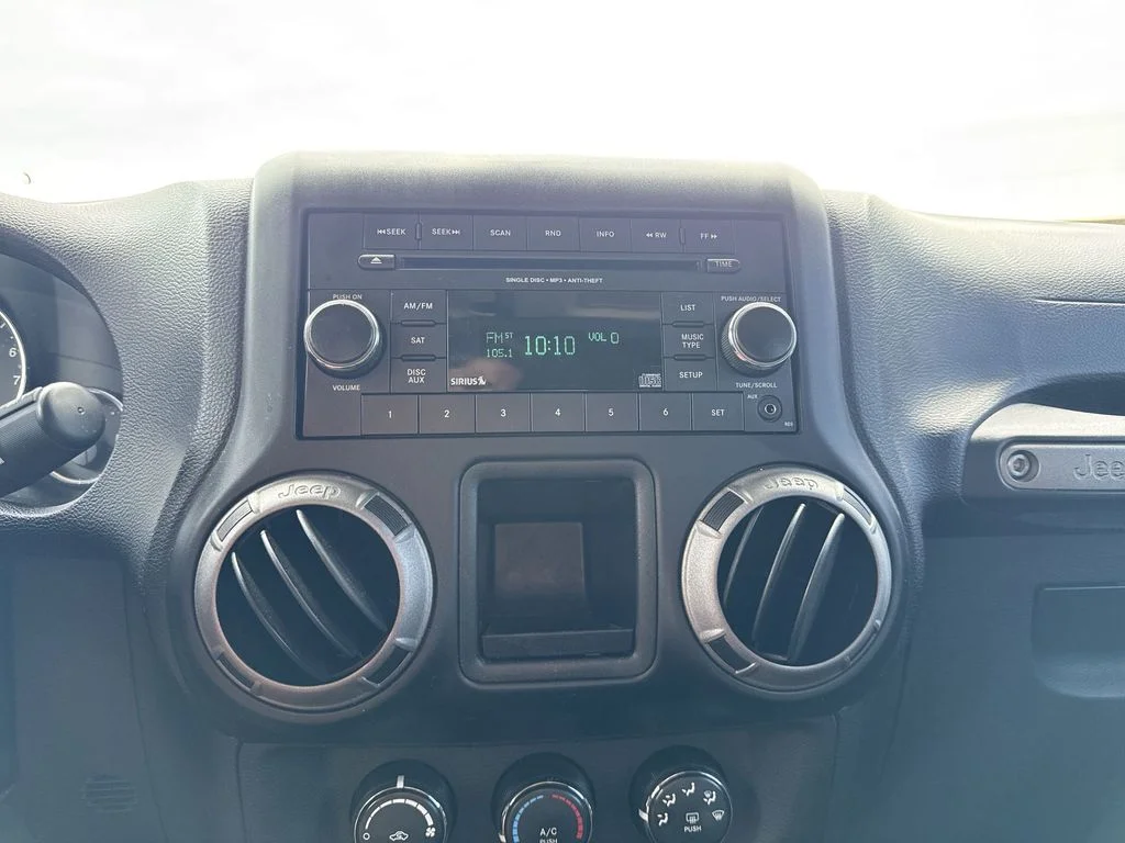Used 2013 Black Jeep Unlimited Sport image 16