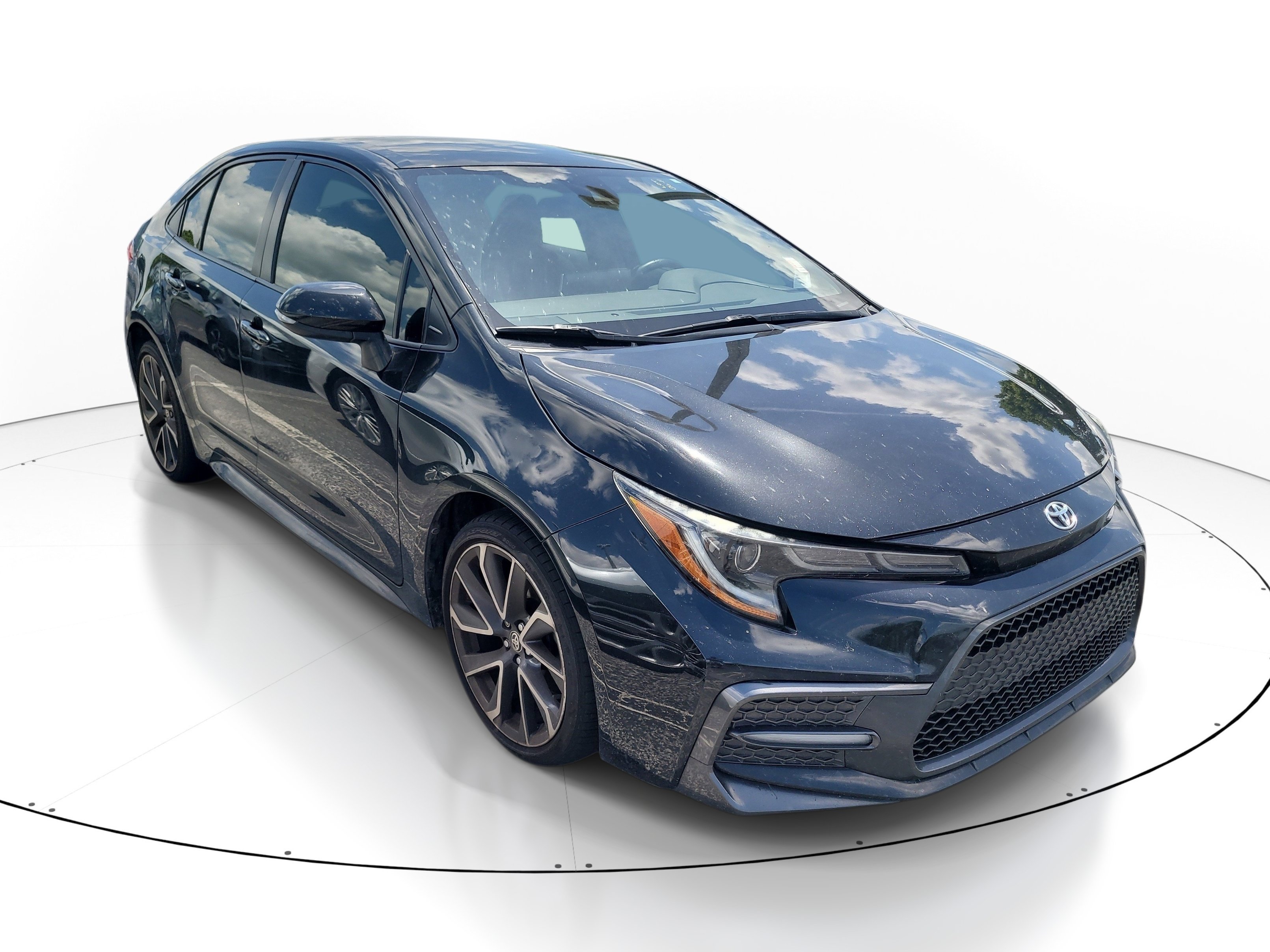 Used 2020 Black Sand Pearl Toyota SE image 1