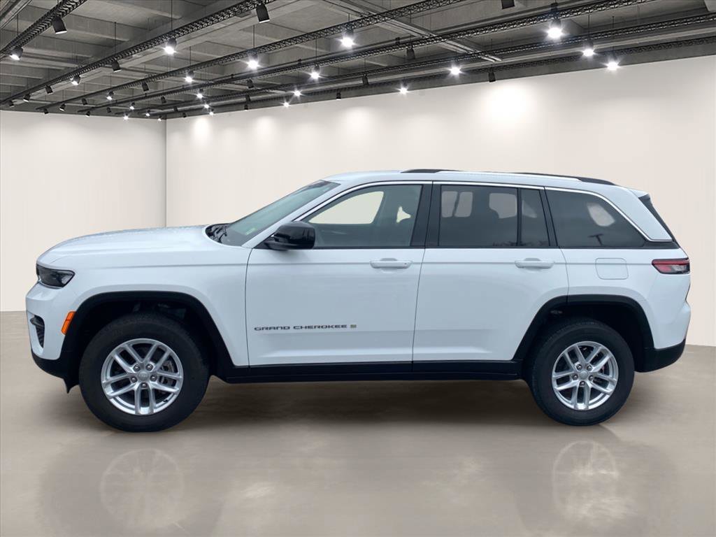 Used 2023 Bright White Clearcoat Jeep Laredo image 4