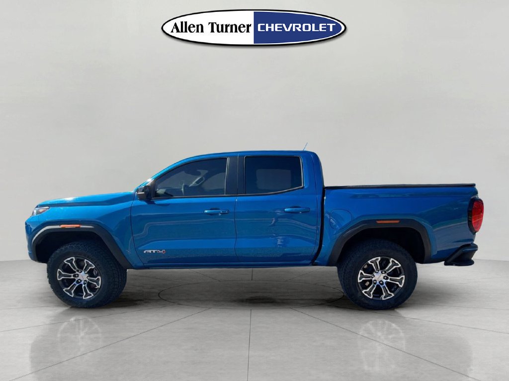 Used 2023 DYNAMIC BLUE METALLIC GMC 4WD AT4 image 6