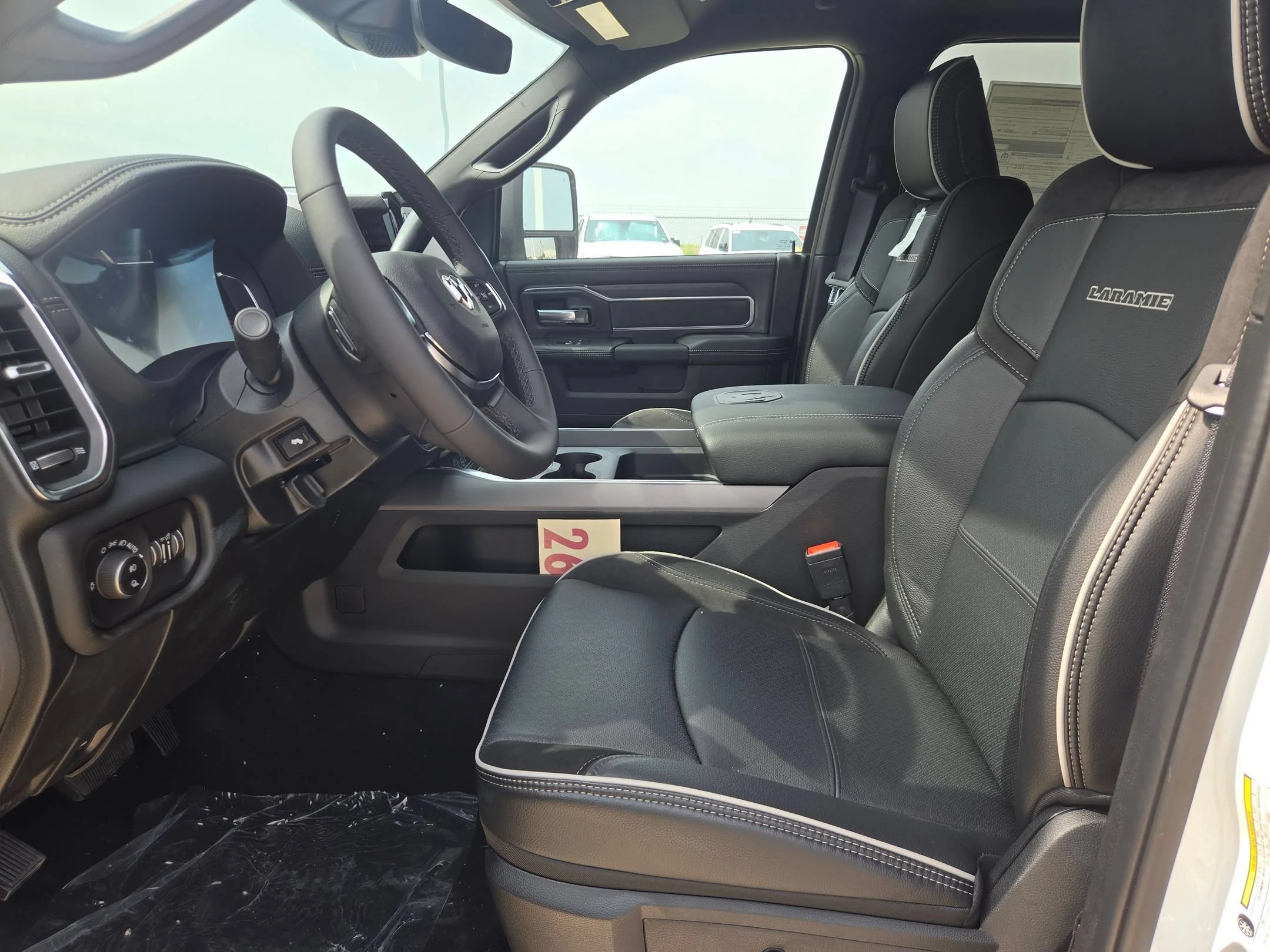 New 2026 Bright White Clear-Coat Exterior Paint RAM Laramie image 9
