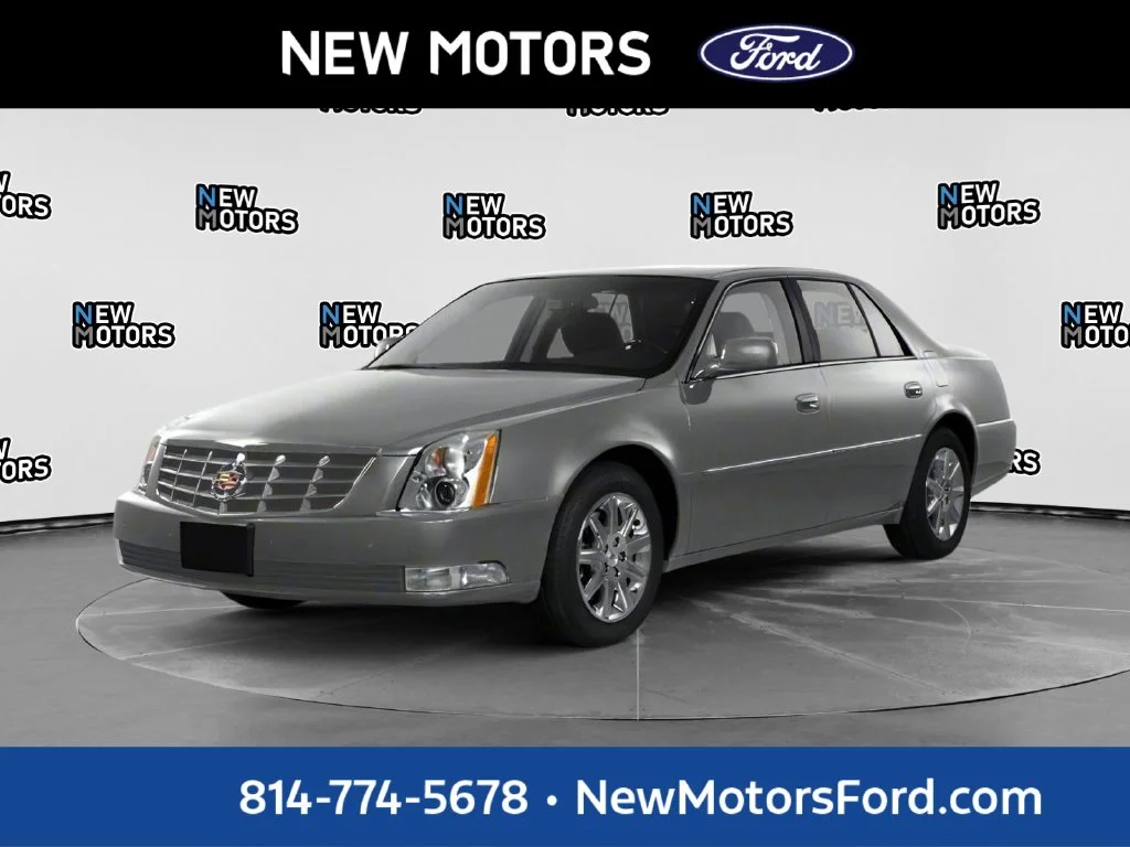 Used 2010 Radiant Silver Cadillac Base image 1