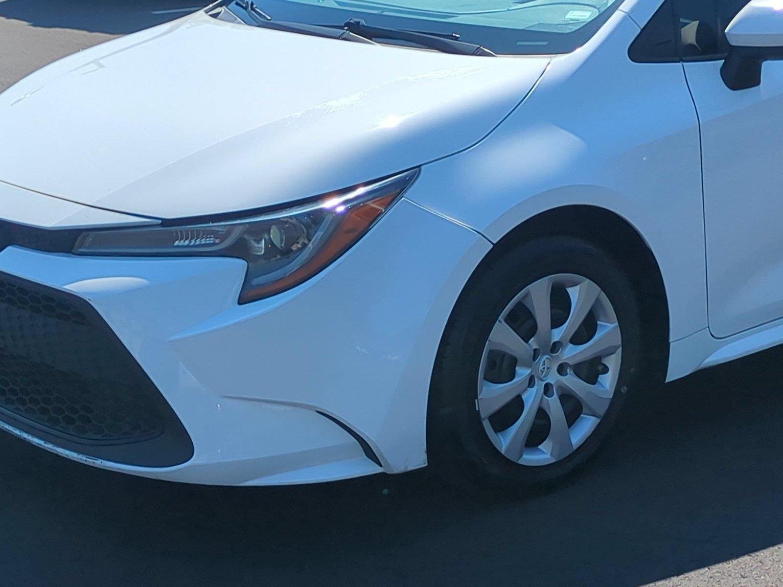 Used 2021 Super White Toyota LE image 9