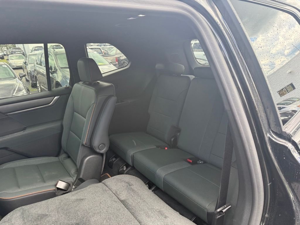 Used 2024 Ebony Twilight Metallic GMC AT4 image 7