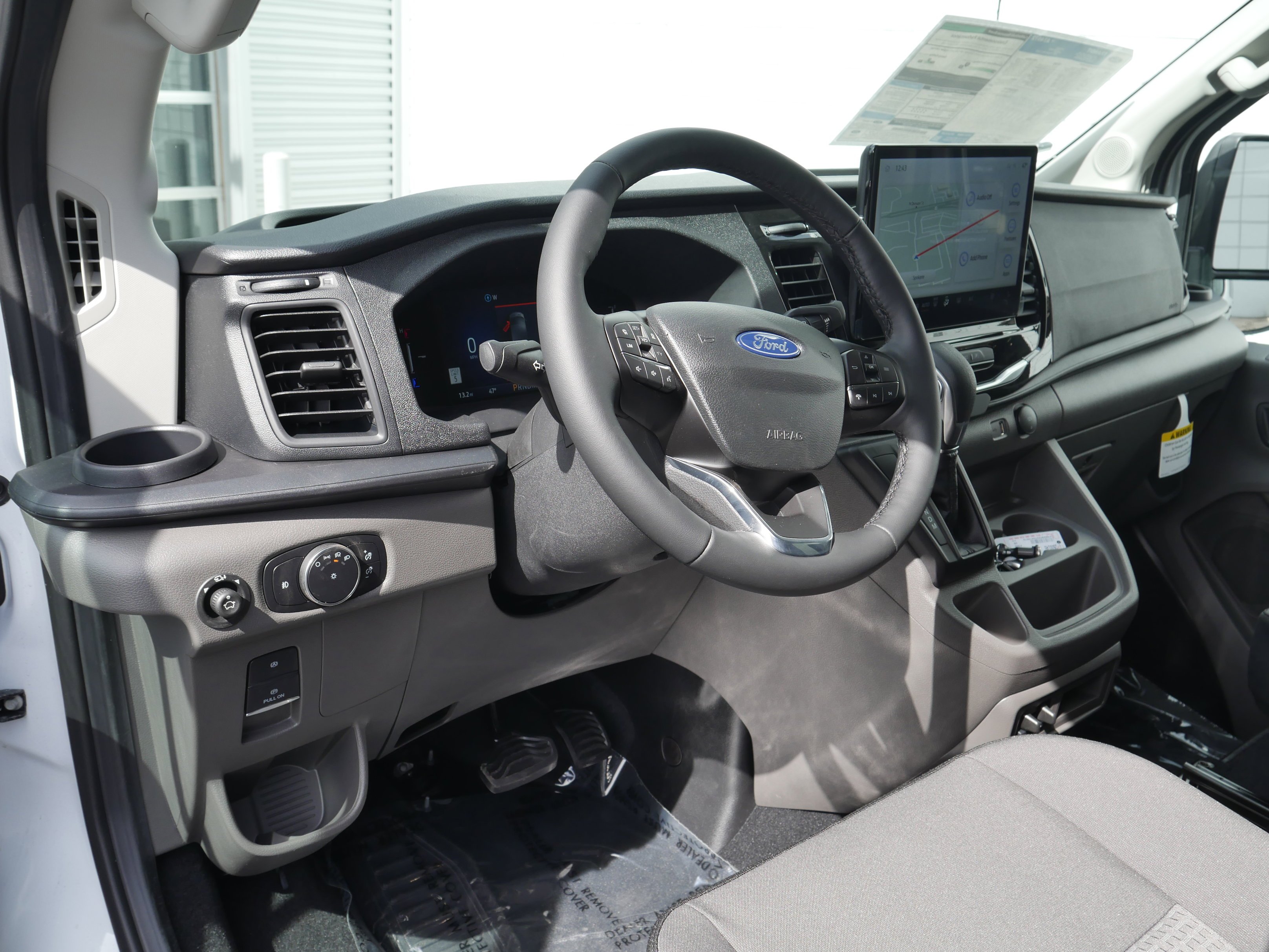 New 2026 Oxford White Ford Passenger Van XLT image 4