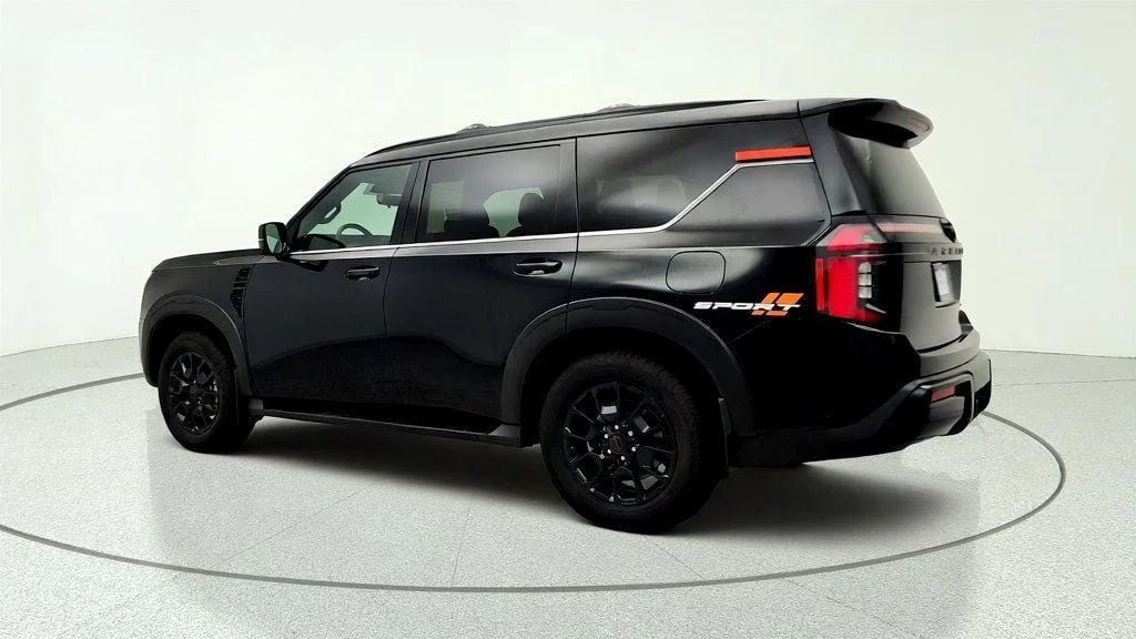Used 2025 Super Black Nissan 4x4 PRO-4X w/ Cross Bars image 7