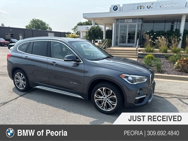 Used 2016 Mineral Gray Metallic BMW xDrive28i image 1