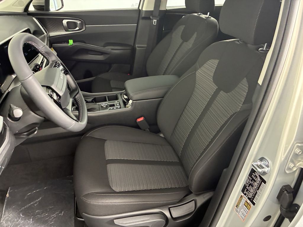 New 2026 Ivory Silver Kia LX image 11