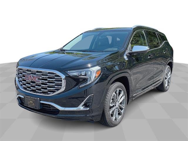 Used 2019 Ebony Twilight Metallic GMC Denali image 1