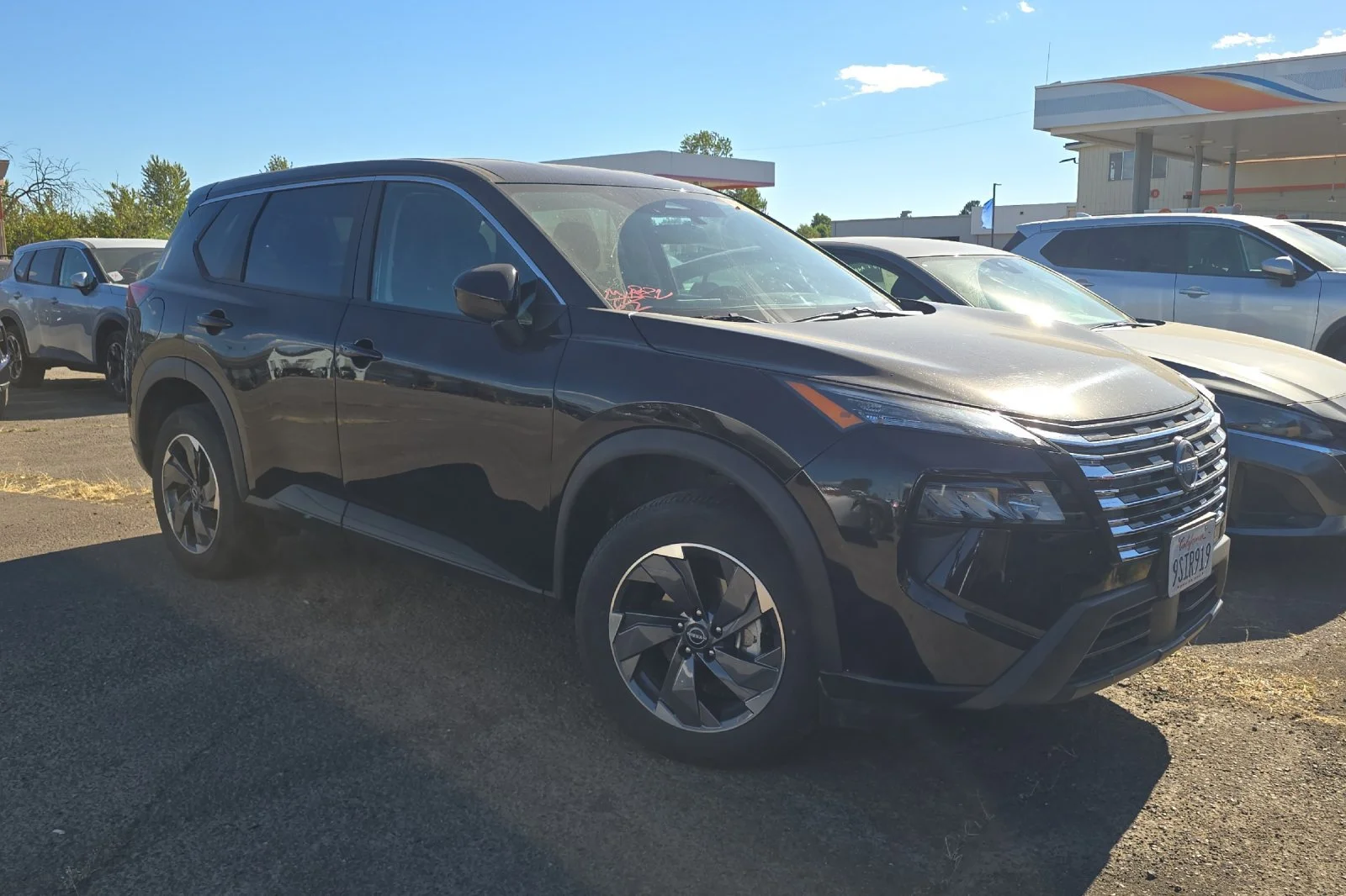 Used 2025 Super Black Nissan SV image 2