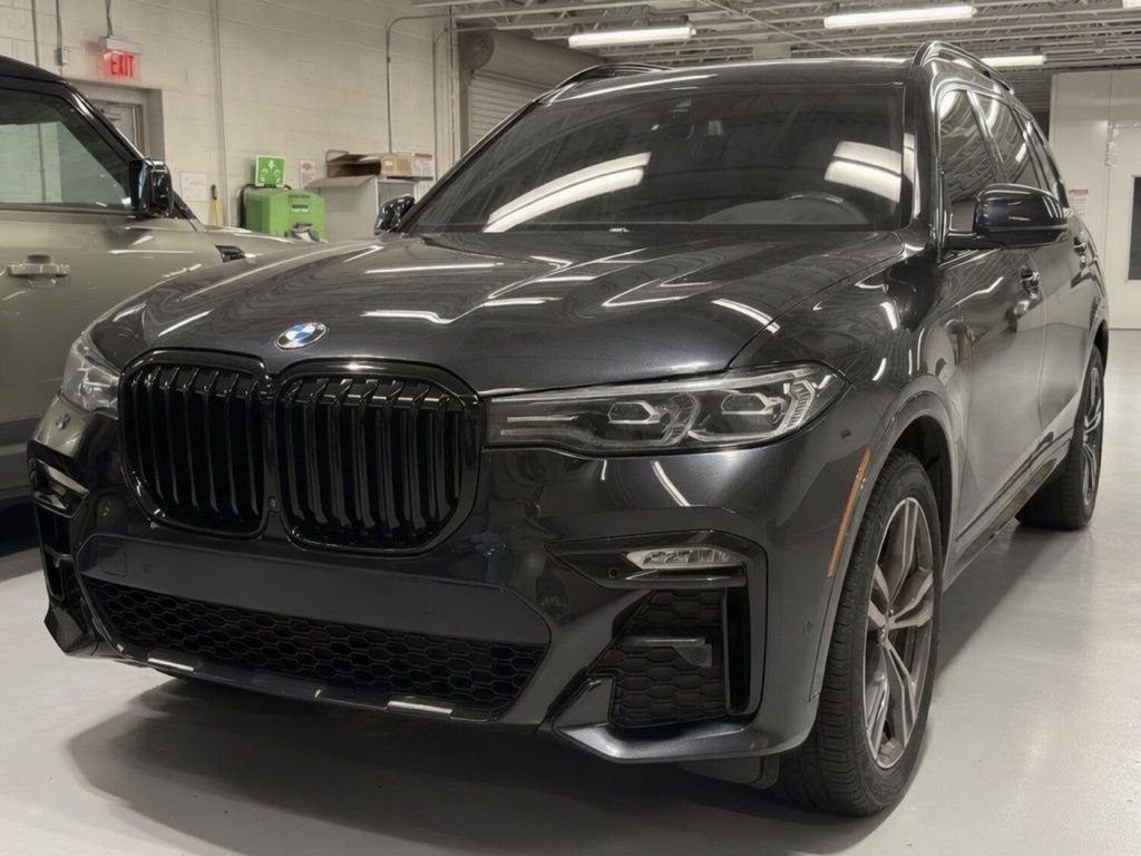 Used 2022 Black Sapphire Metallic BMW xDrive40i image 1