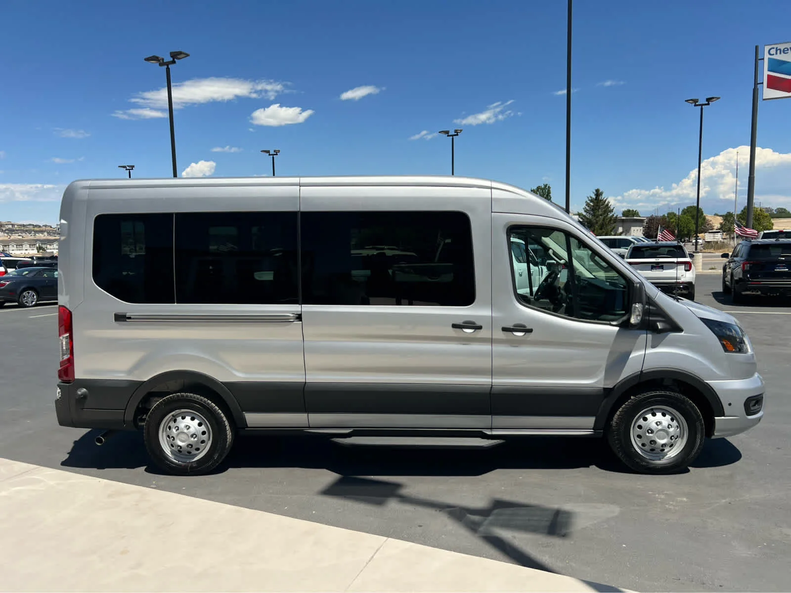 New 2026 Ingot Silver Metallic Ford Passenger Van XLT image 6