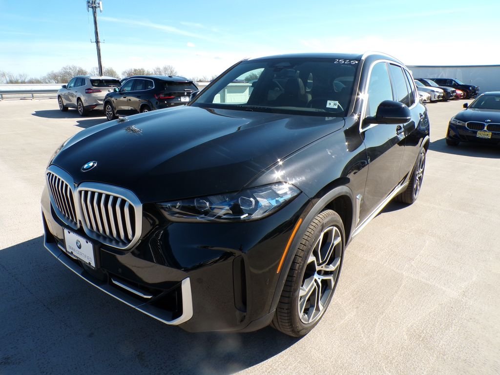 Certified Used 2026 Black Sapphire Metallic BMW xDrive40i image 3