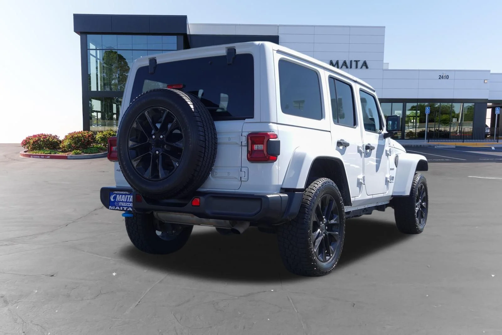 Used 2024 Bright White Clearcoat Jeep Sahara 4xe image 3