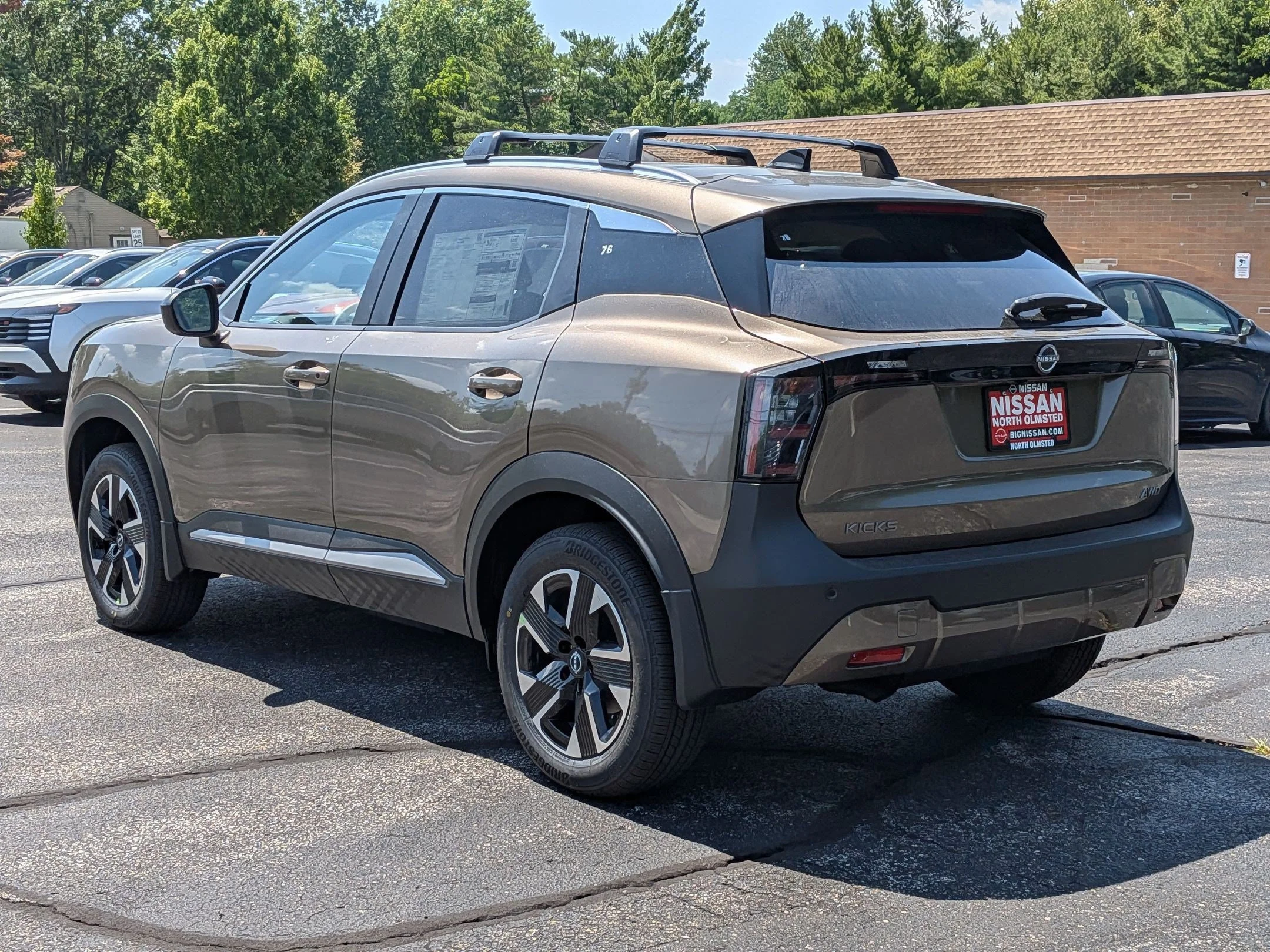New 2026 Bronze Metallic Nissan SV image 8
