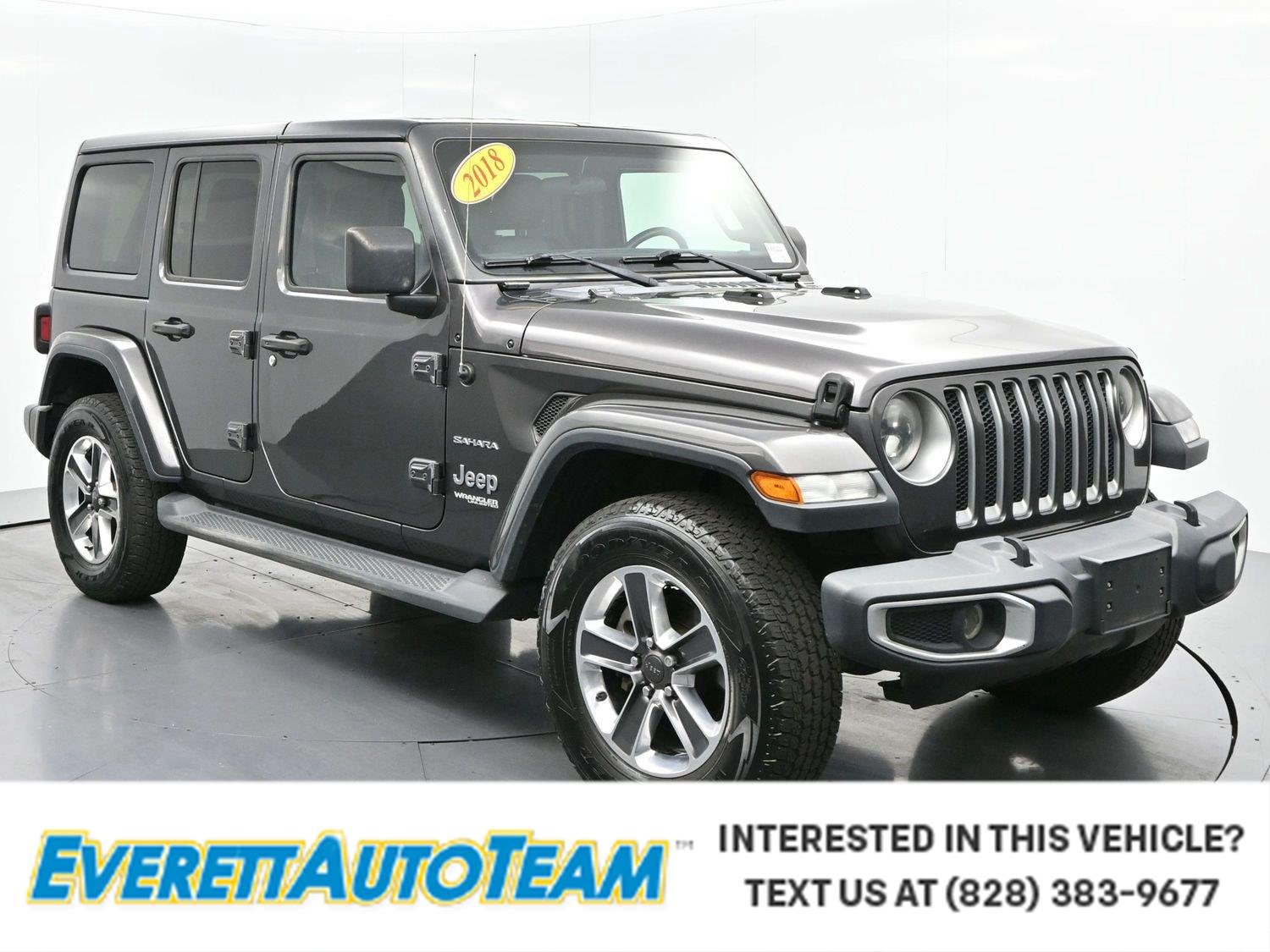 Used 2018 Granite Crystal Metallic Clearcoat Jeep Sahara image 1