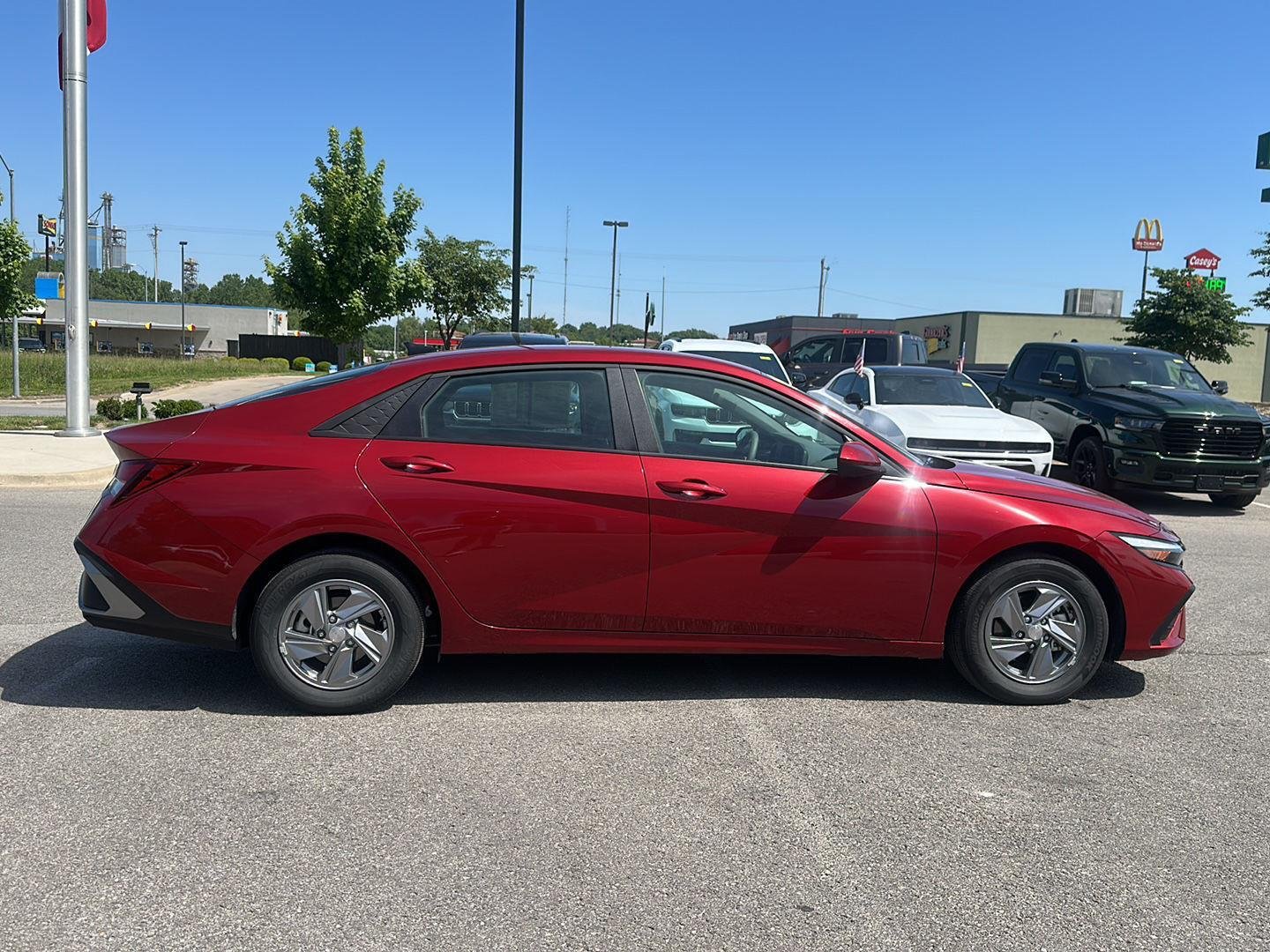 Used 2025 Ultimate Red Hyundai SE image 4