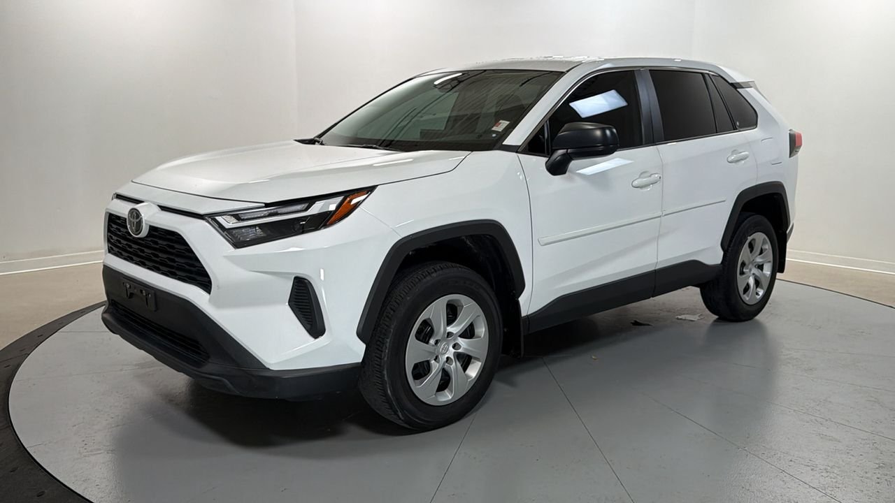 Used 2023 White Toyota LE image 1