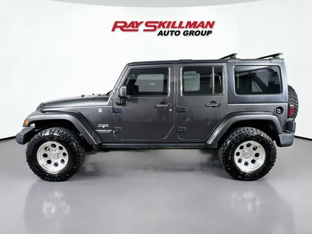 Used 2017 Gray Jeep Unlimited Sahara image 4
