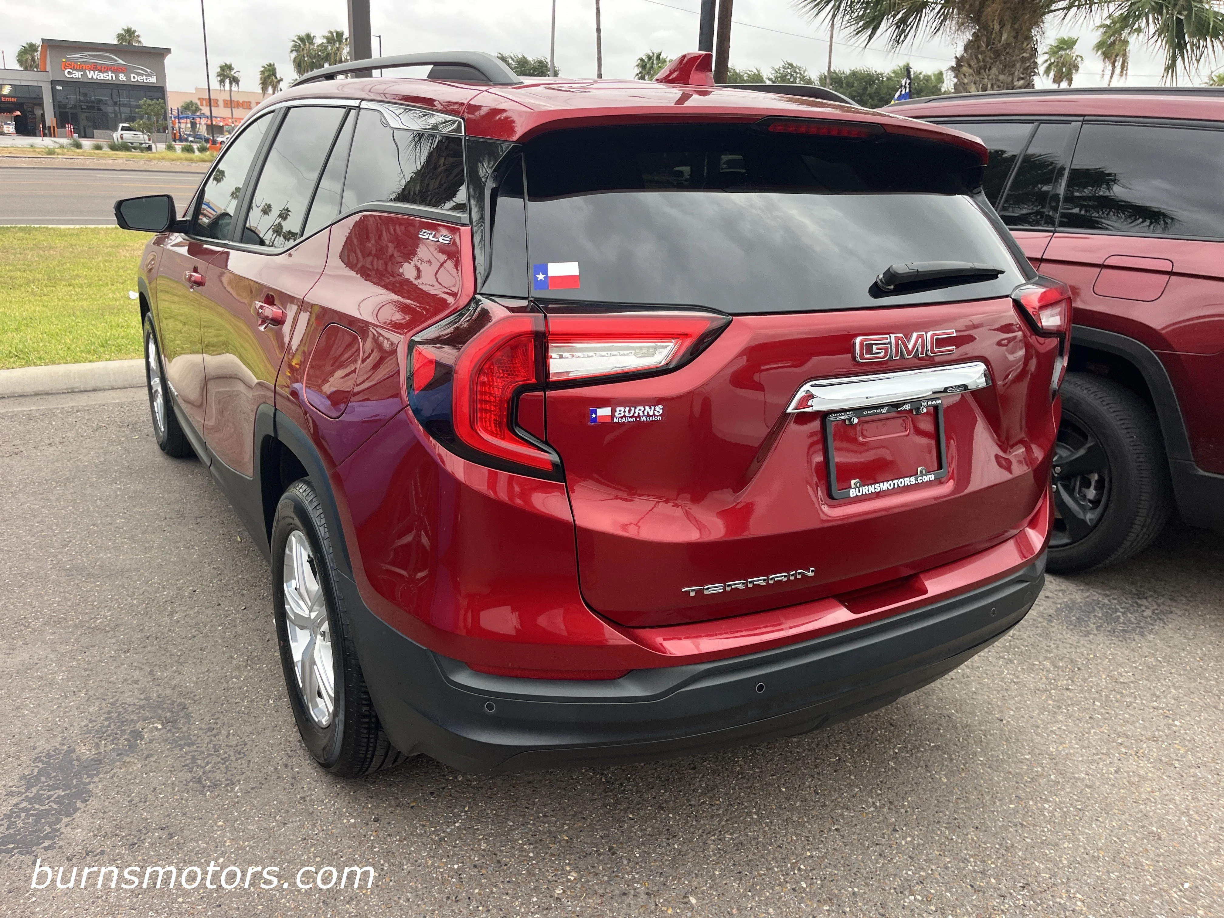 Used 2024 Volcanic Red Tint GMC SLE image 5