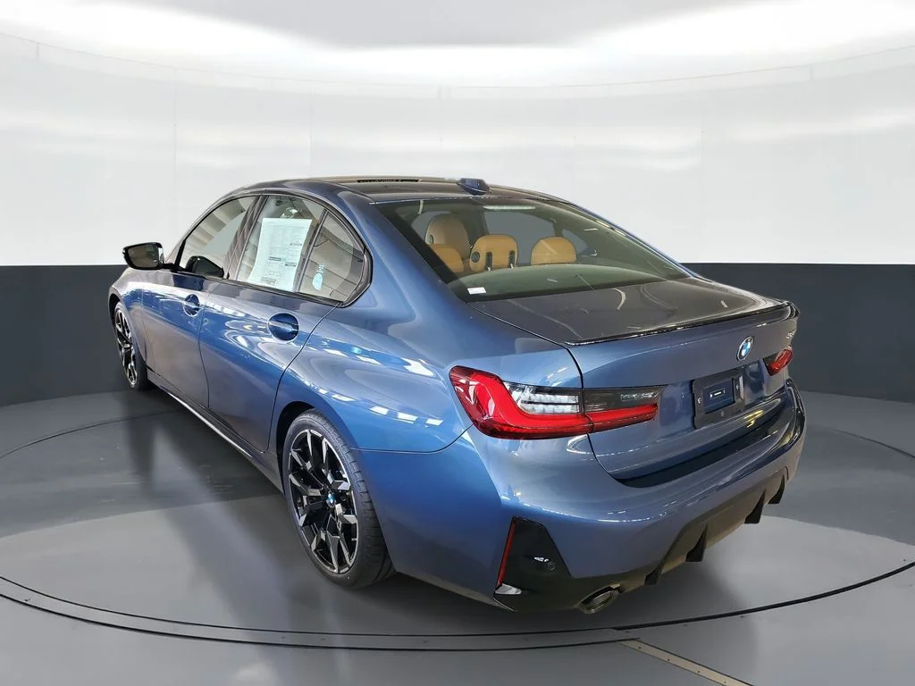 New 2026 Arctic Race Blue metallic BMW 330i image 4