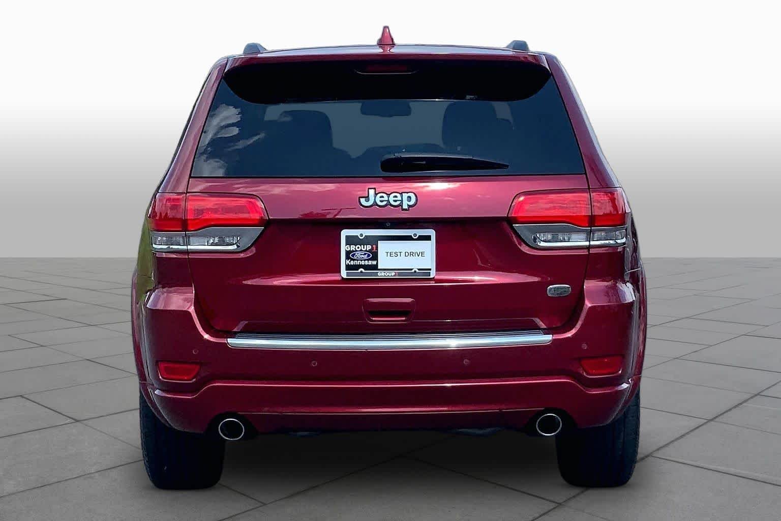 Used 2014 Deep Cherry Red Crystal Pearlcoat Jeep Overland image 4