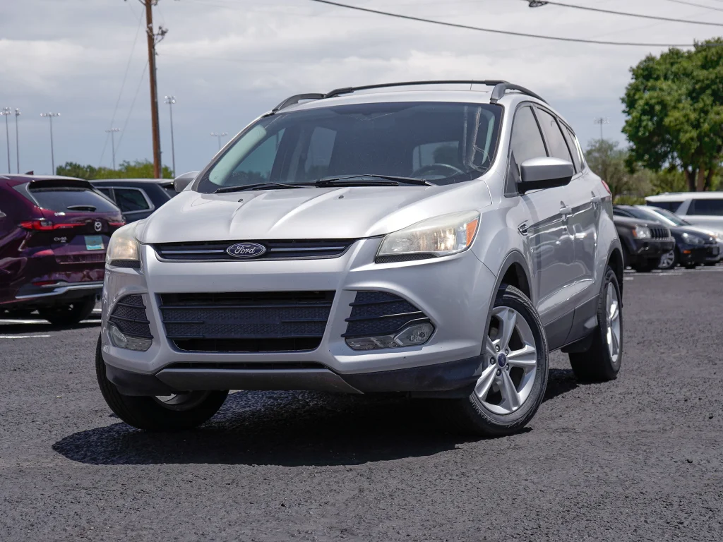 Used 2016 Ruby Red Metallic Tinted Clearcoat Ford SE image 1
