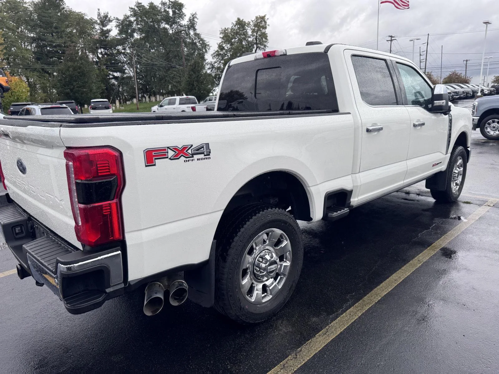 Used 2023 Star White Metallic Tri-Coat Ford Lariat image 4