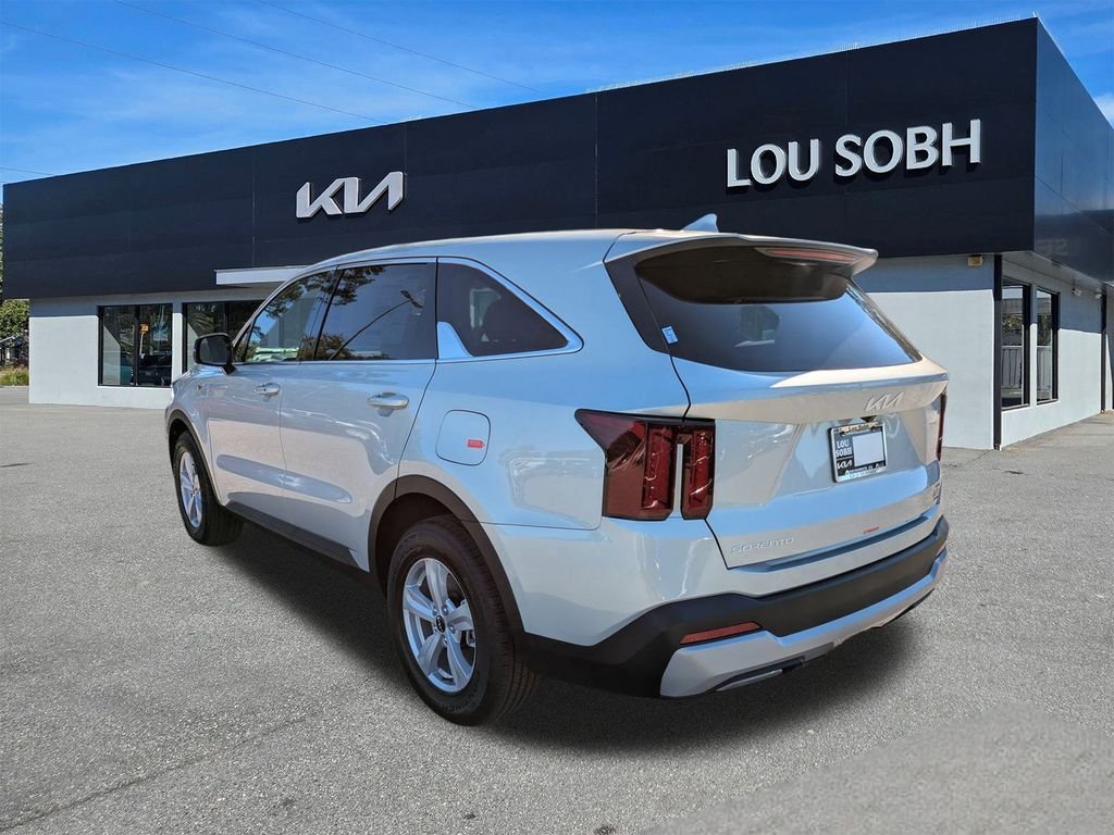 New 2026 Ivory Silver Kia LX image 5