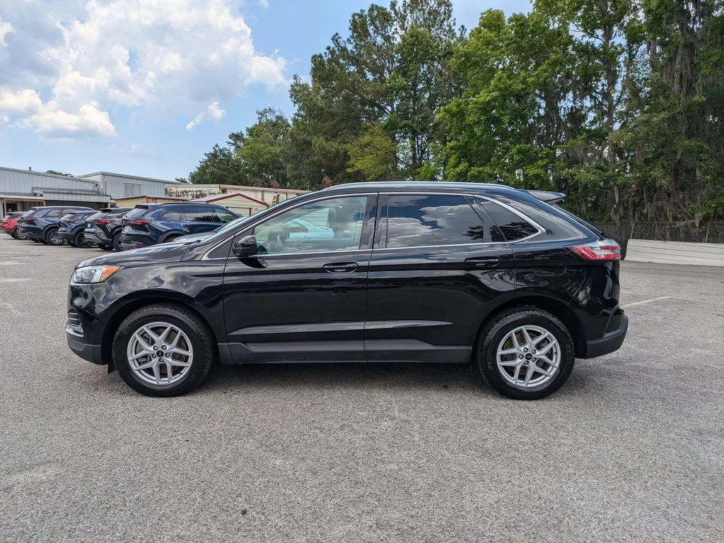 Certified Used 2024 Agate Black Metallic Ford SEL image 7