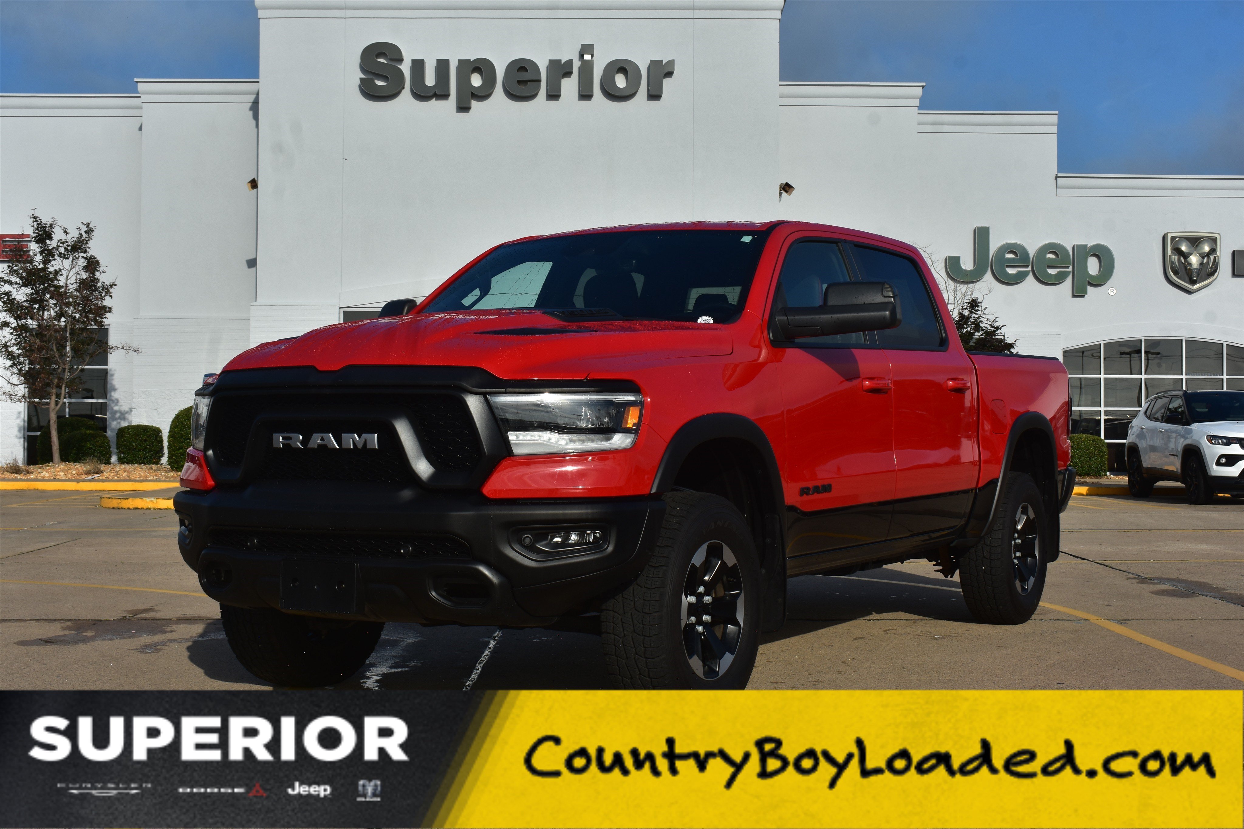 Used 2022 Flame Red Clearcoat Ram Rebel image 1