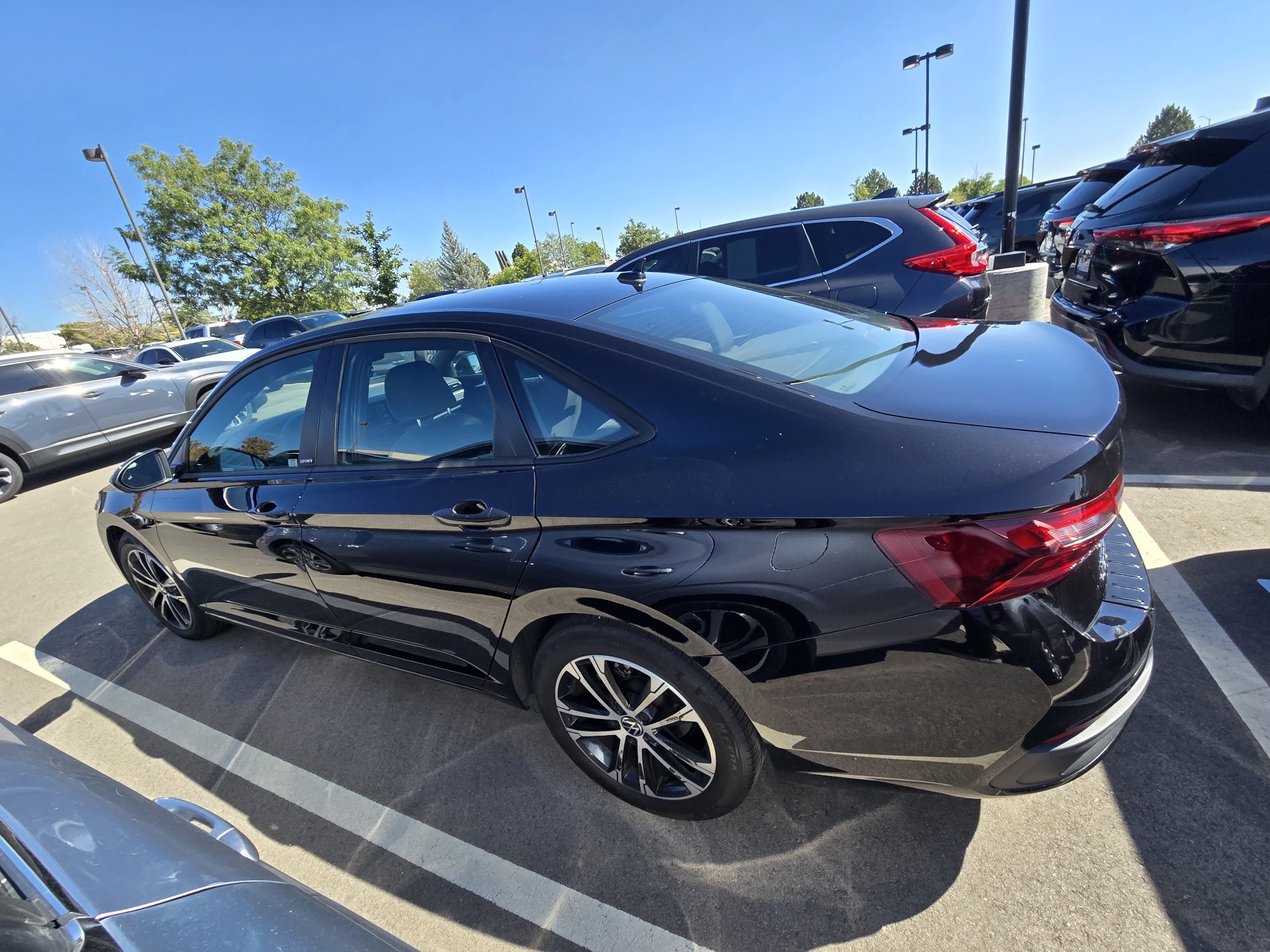 Used 2024 Deep Black Pearl Volkswagen Sport image 12