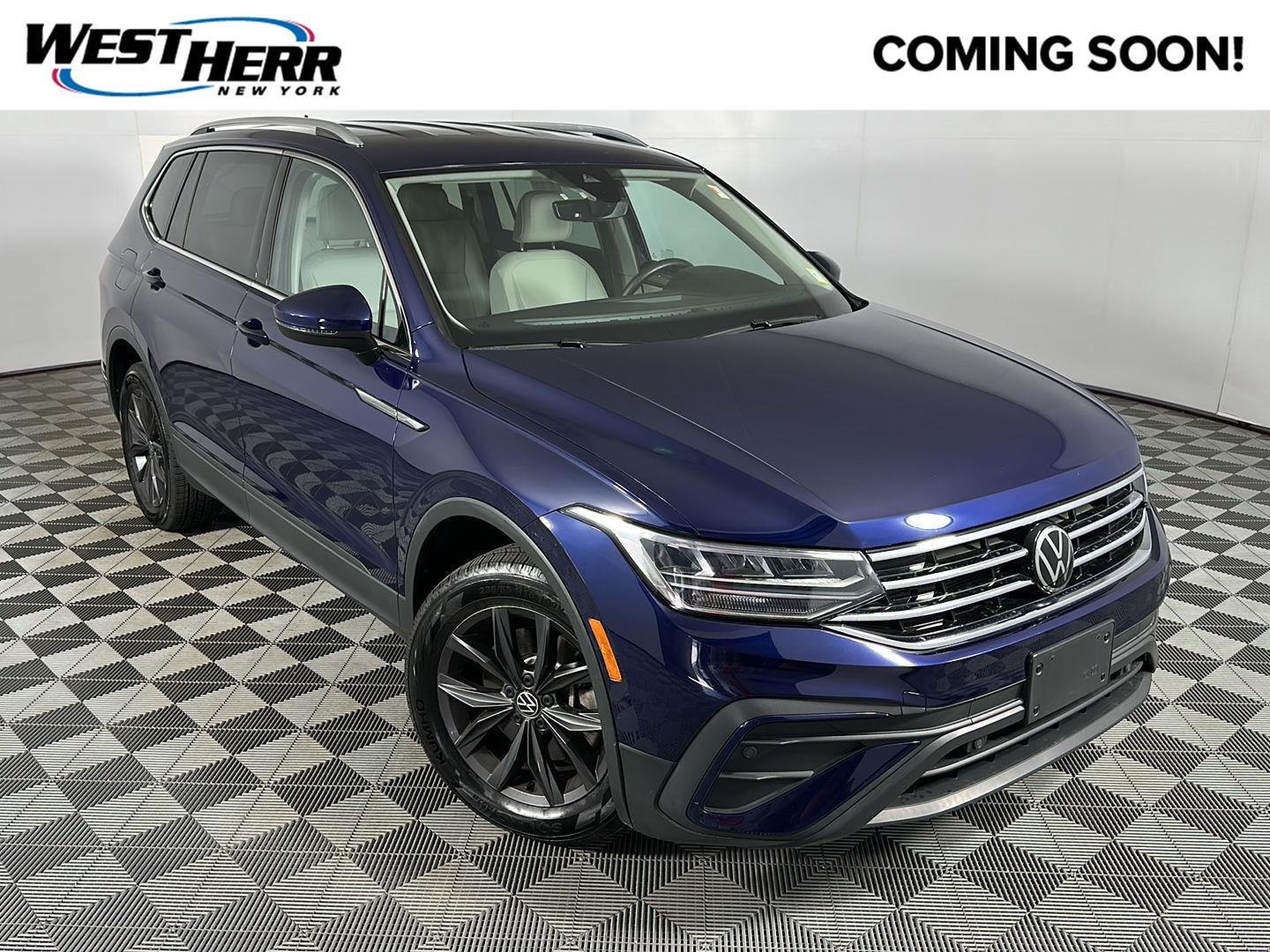 Used 2022 Atlantic Blue Metallic Volkswagen SE image 1