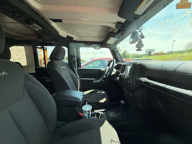 Used 2017 Black Jeep Unlimited Sahara image 11